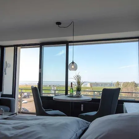 Fewo-304-mit-meerblick-und-strandkorb-im-haus-jan-am-strand-in-doese Cuxhaven